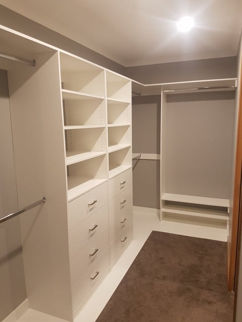 Custom walk-in wardrobe with shelving and hanging rods by Rod on the Mornington Peninsula