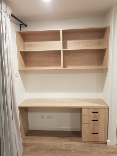 Custom cabinet making with open shelving and drawers for a home study nook