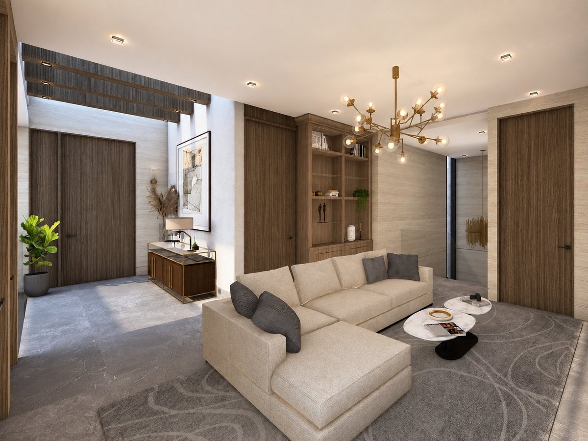Modern living room with cream sectional sofa, wood cabinetry, brass chandelier, and neutral decor