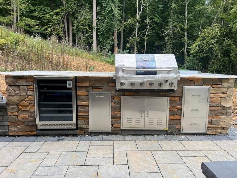 Custom Patio & Outdoor Kitchen by Damare Landscaping