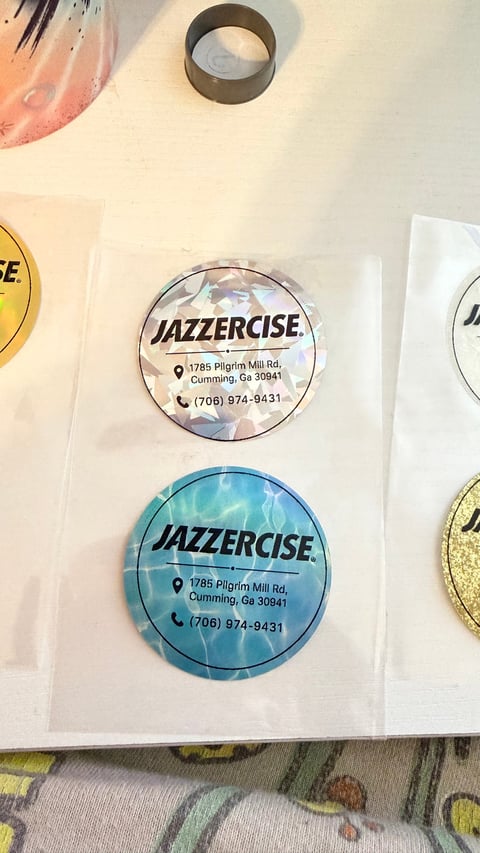 Circular Jazzercise promotional stickers with address and phone number