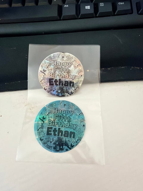 Happy Fifth Birthday Ethan labels in silver and turquoise on clear backing