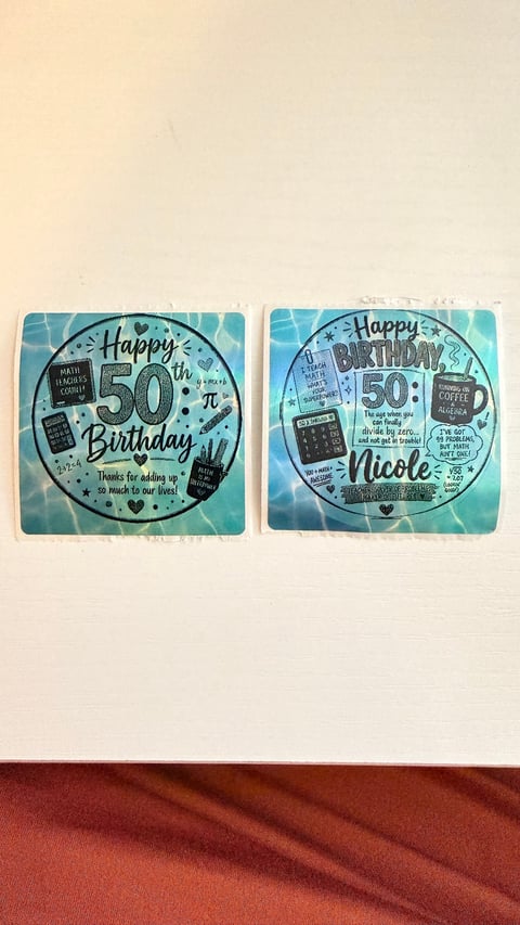Two turquoise 50th birthday labels personalized for Nicole with math theme and decorative designs