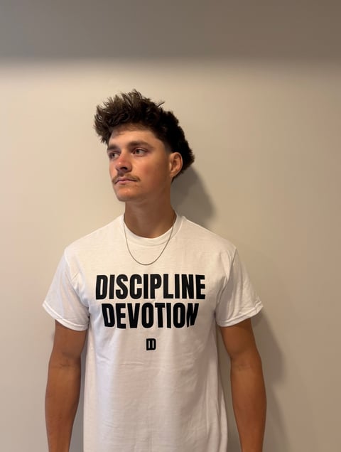 Community member in DISCIPLINE tee