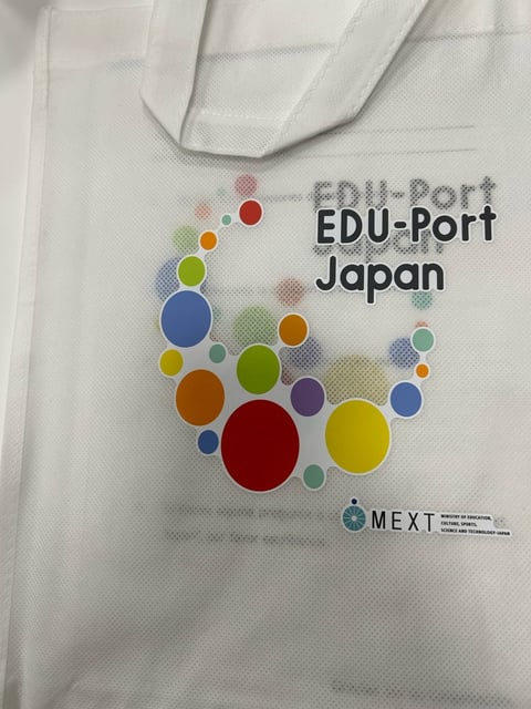 White tote bag with EDU-Port Japan logo featuring colorful circles and MEXT organization text
