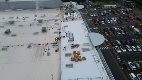 Large commercial roof with HVAC equipment