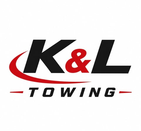 K&L Towing company logo with black letters, red ampersand, and curved red swoosh accent
