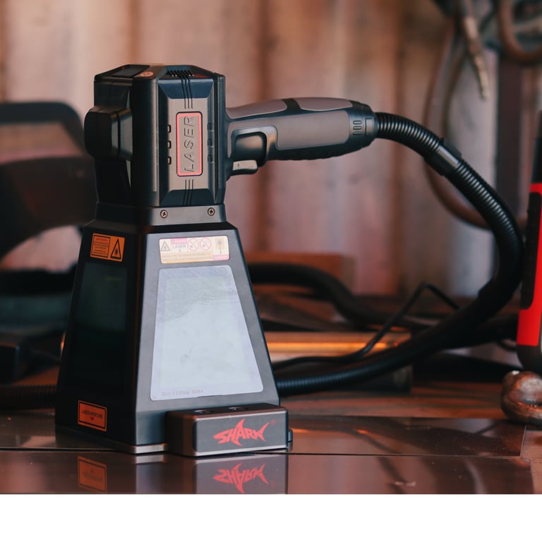 Black and silver soldering iron station with articulated arm and display panel on reflective surface