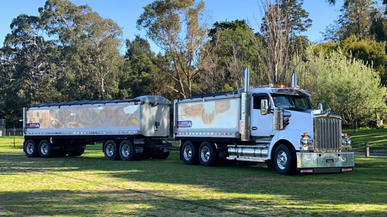 Aussie Soils Kenworth truck and tanker trailer for bulk material transport and cartage services