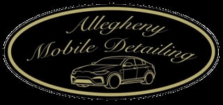 A.M.D. logo with gold lettering and car silhouette on dark oval badge