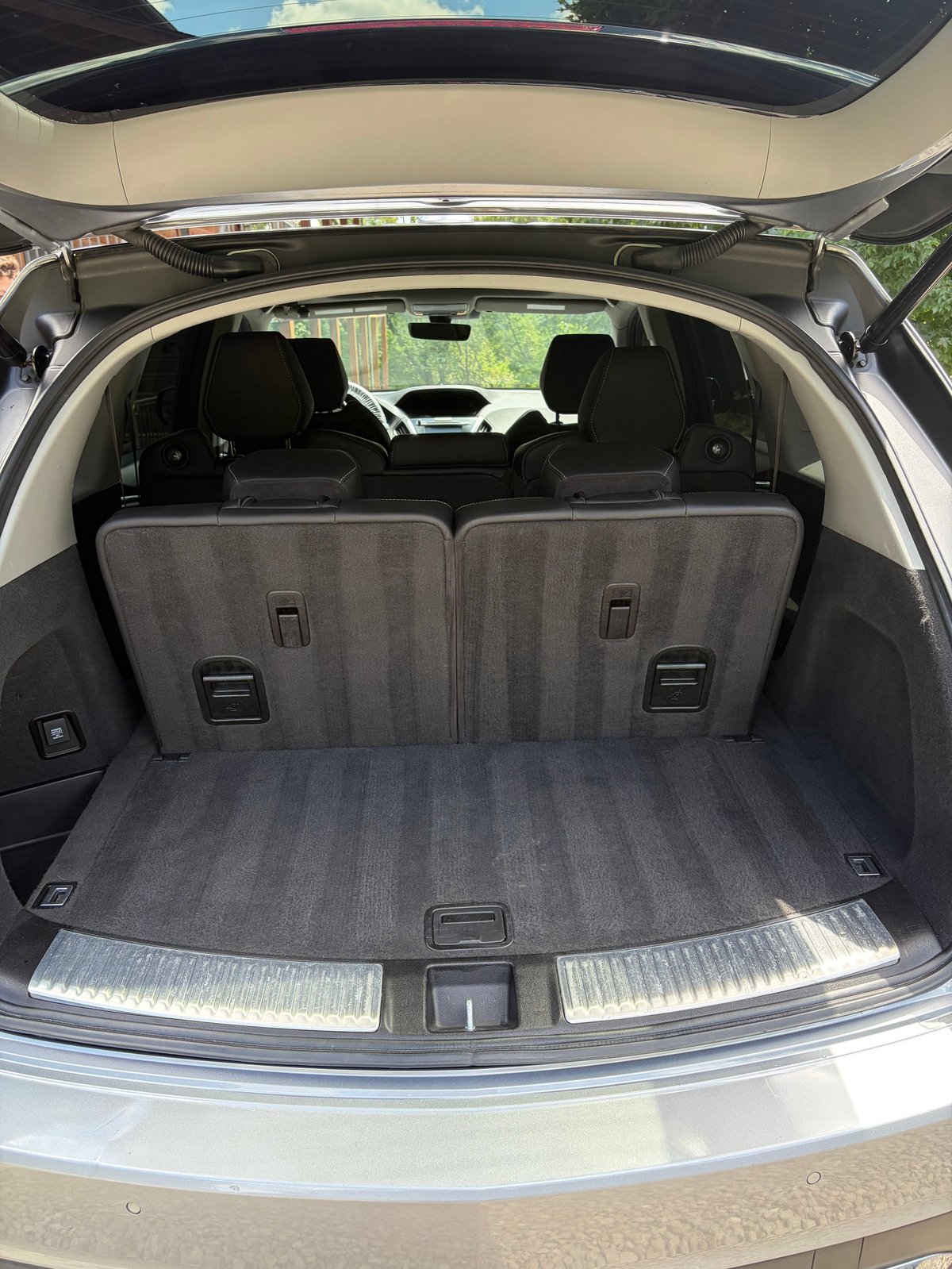 This like-new cargo area with carpet cleaned back to showroom condition