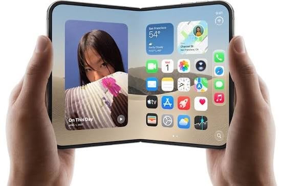 Hands holding a foldable smartphone with curved display showing home screen, weather widget, and app icons