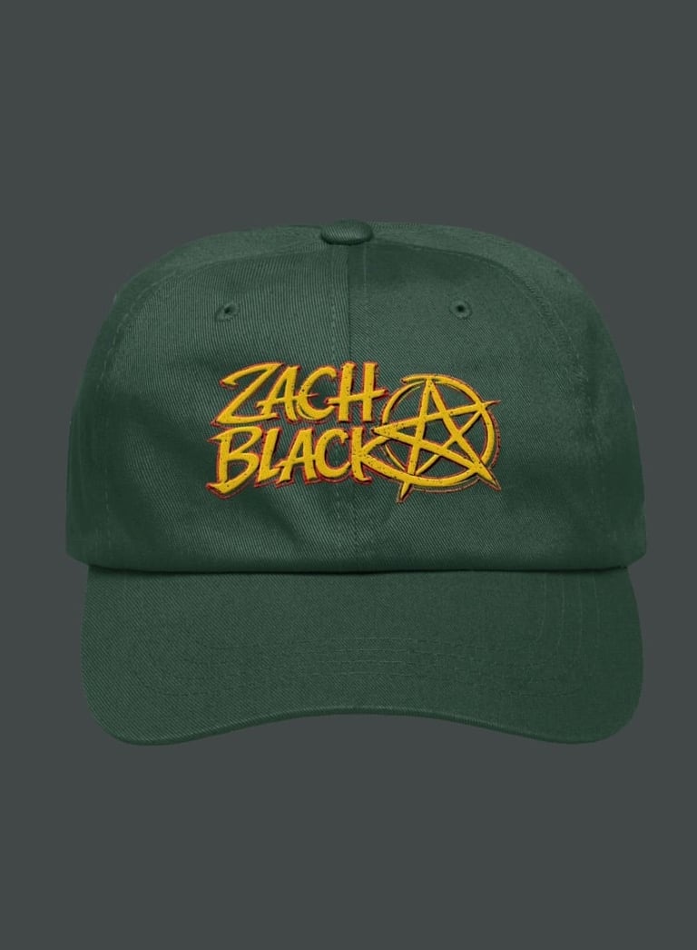 Green baseball cap with yellow Zach Black logo and pentagram symbol on front, displayed against gray background