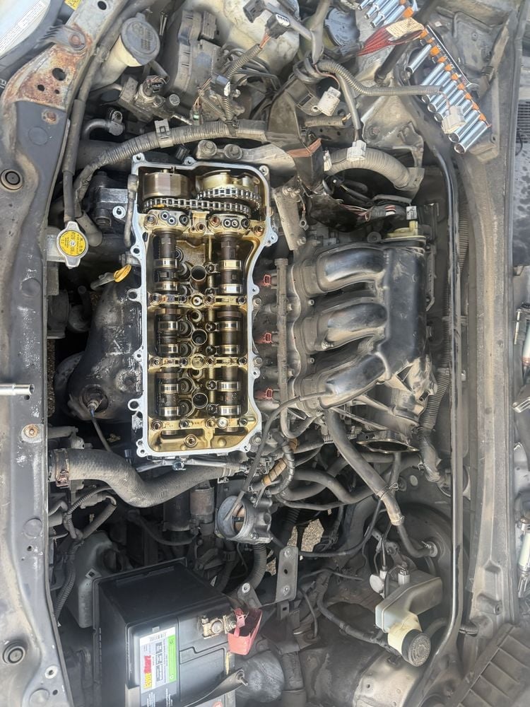 Top-end engine rebuild — camshafts and valve train exposed