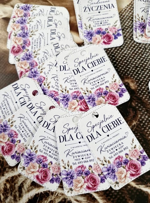 Collection of decorative Polish business cards with floral designs featuring pink and purple roses and handwritten text