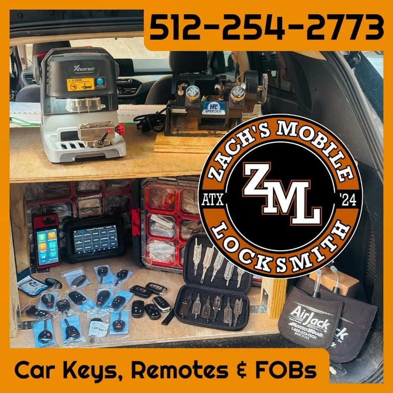 Zach's Mobile Locksmith professional tools and equipment display including car keys, remotes, FOBs, diagnostic devices, and key cutting machinery
