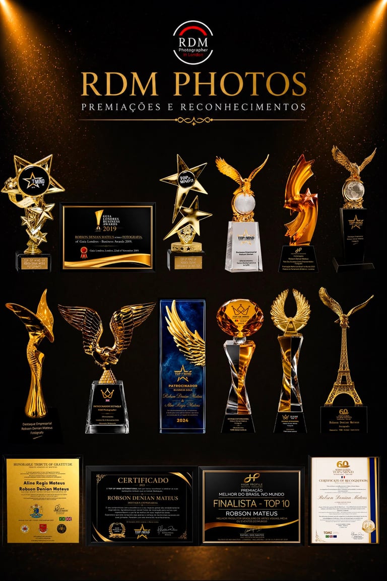 RDM Photos awards and recognition showcase displaying multiple golden trophies, plaques, and certificates on black background with golden lighting
