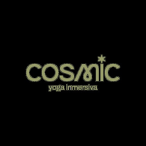 COSMIC yoga inmersiva logo in gold lettering with star symbol on black background