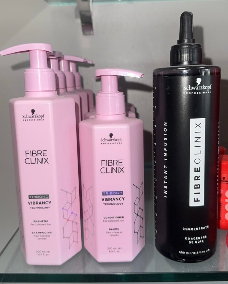 Schwarzkopf Professional Fibre Clinix Tribond Vibrancy shampoo, conditioner, and Instant Infusion Concentrate.