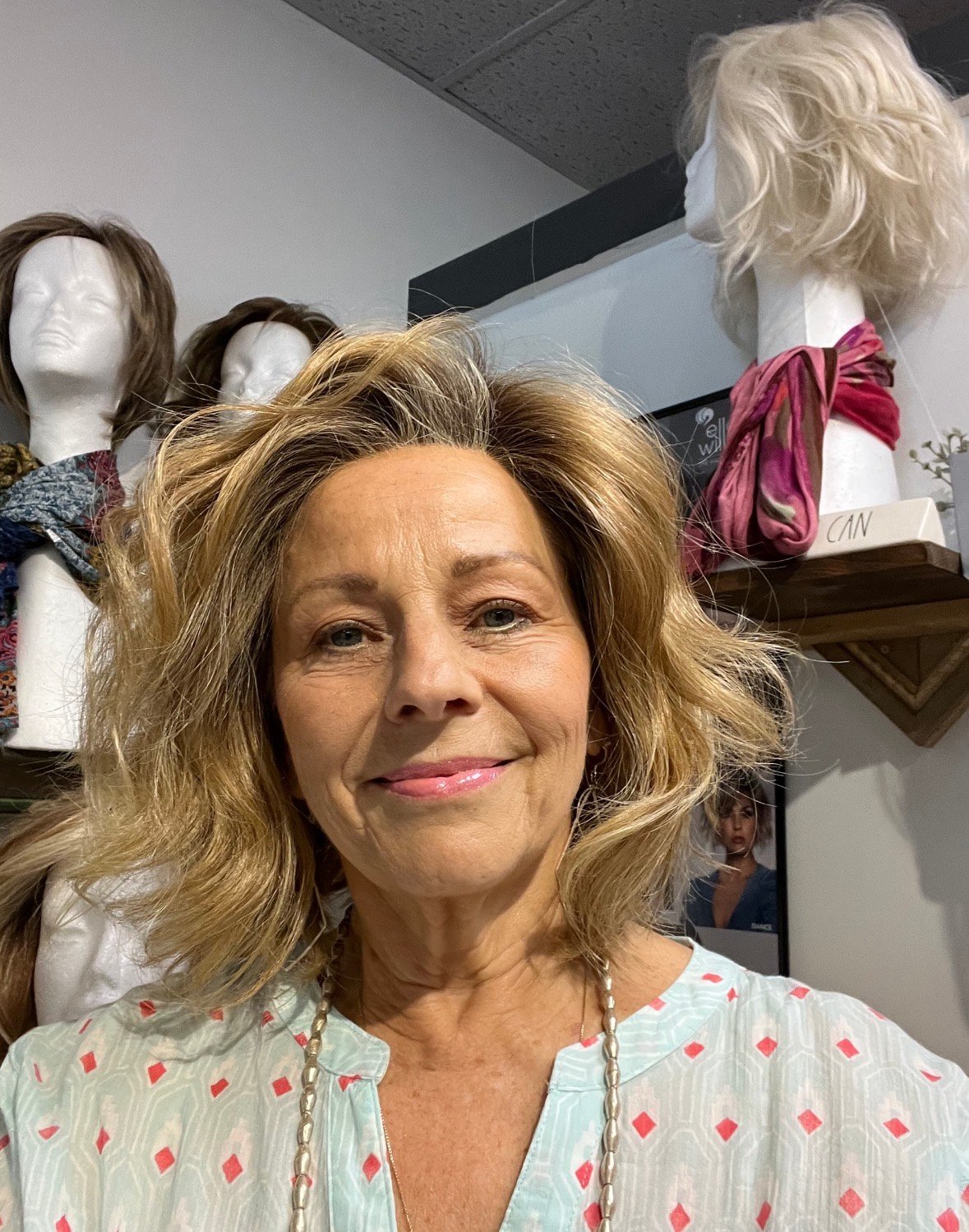 Kerry Neville of New U Wigs inside Trendsetters of Hendersonville
