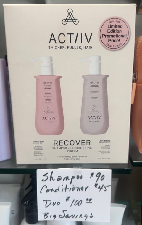 ACTIIV Recover for Women shampoo and conditioner system with Trendsetters salon price sign