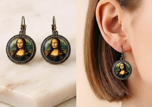 Pair of vintage-style circular earrings featuring Mona Lisa portrait in antique bronze setting, shown on marble surface and worn on ear