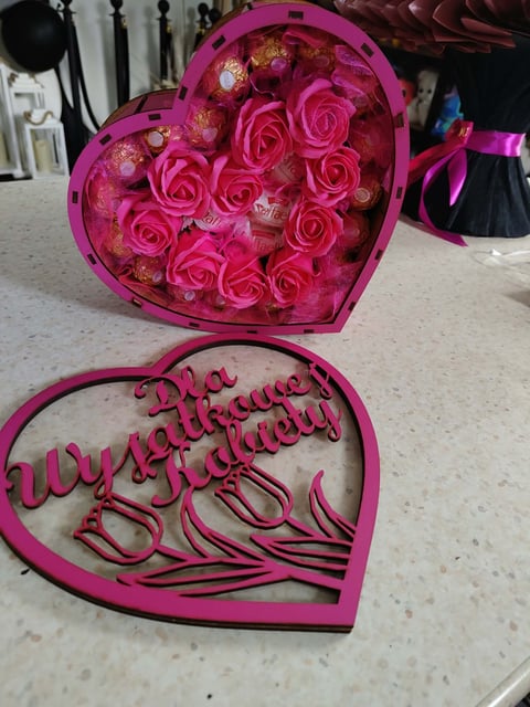 Pink heart-shaped floral arrangement with roses and decorative heart box with text saying My Valentine Delivery