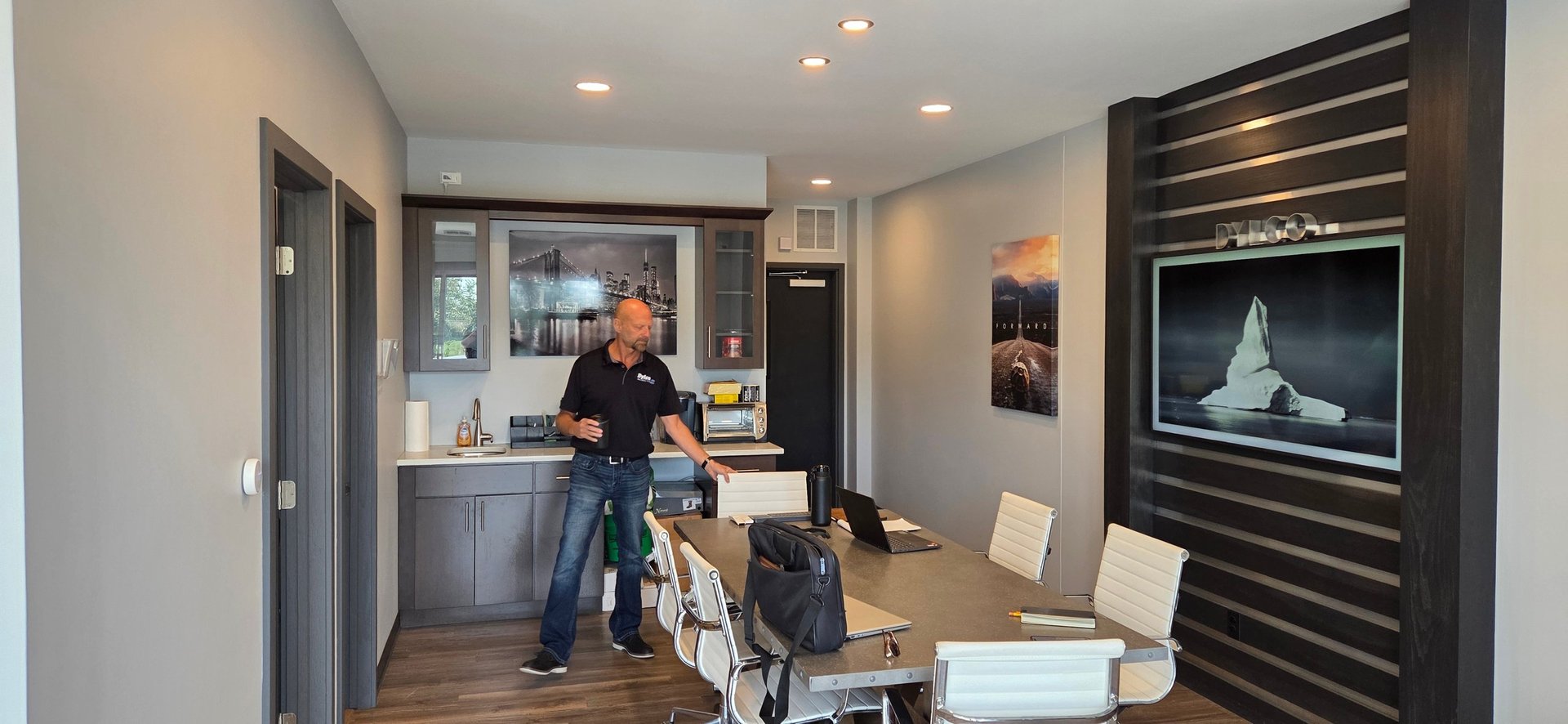 Modern Dylco Electric showroom with kitchen display and contemporary lighting