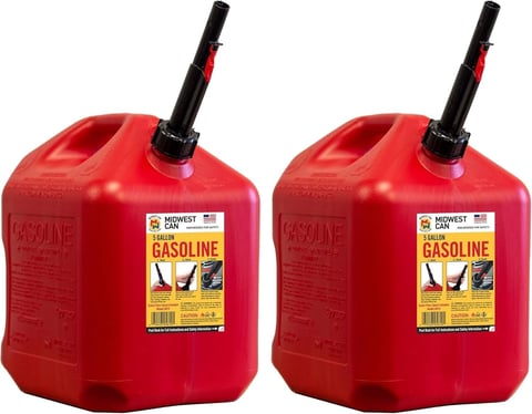 Two red plastic gasoline cans with black spouts and yellow warning labels on white background