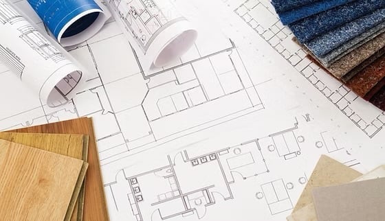 Architectural blueprints and material samples for Holsclaw Building general contracting projects in Northern Wisconsin