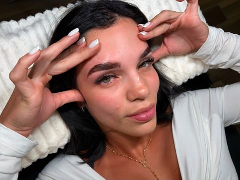 Client result: sculpted brows with soft lash definition