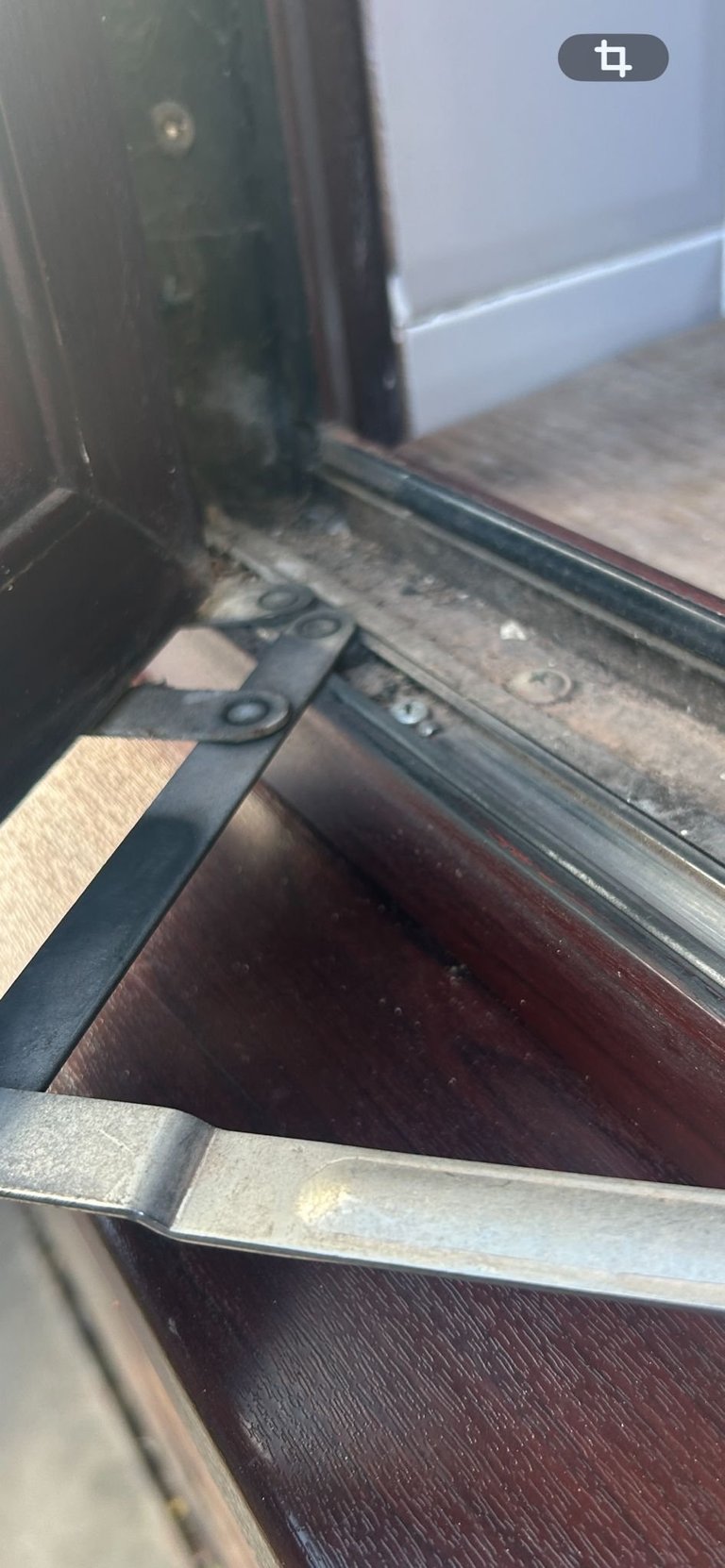 Close-up of an open door showing weathered rubber seal