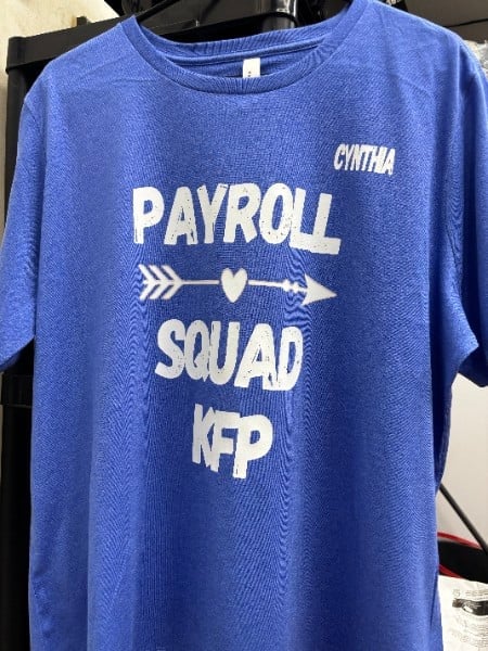 Blue t-shirt printed with a custom team design
