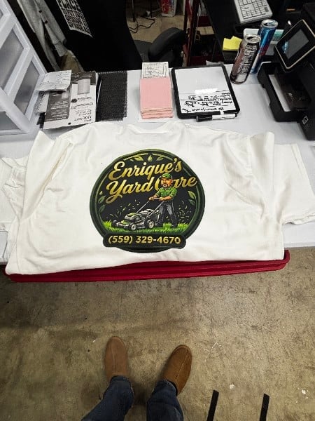 White t-shirt printed with a hardware store logo