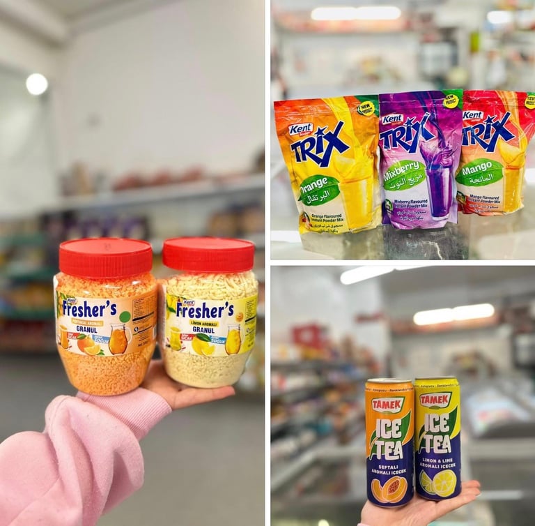 Hand holding Freshers drink bottles and TRY juice pouches at Asiatisk og Europeisk mat