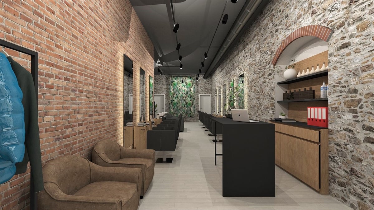Modern retail or gallery interior with exposed brick walls, wooden counters, archway, accent lighting, and contemporary seating area