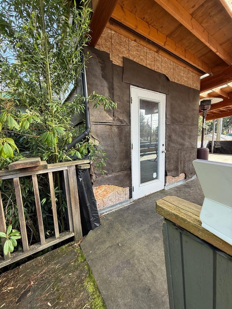 Outdoor patio with concrete flooring before renovation