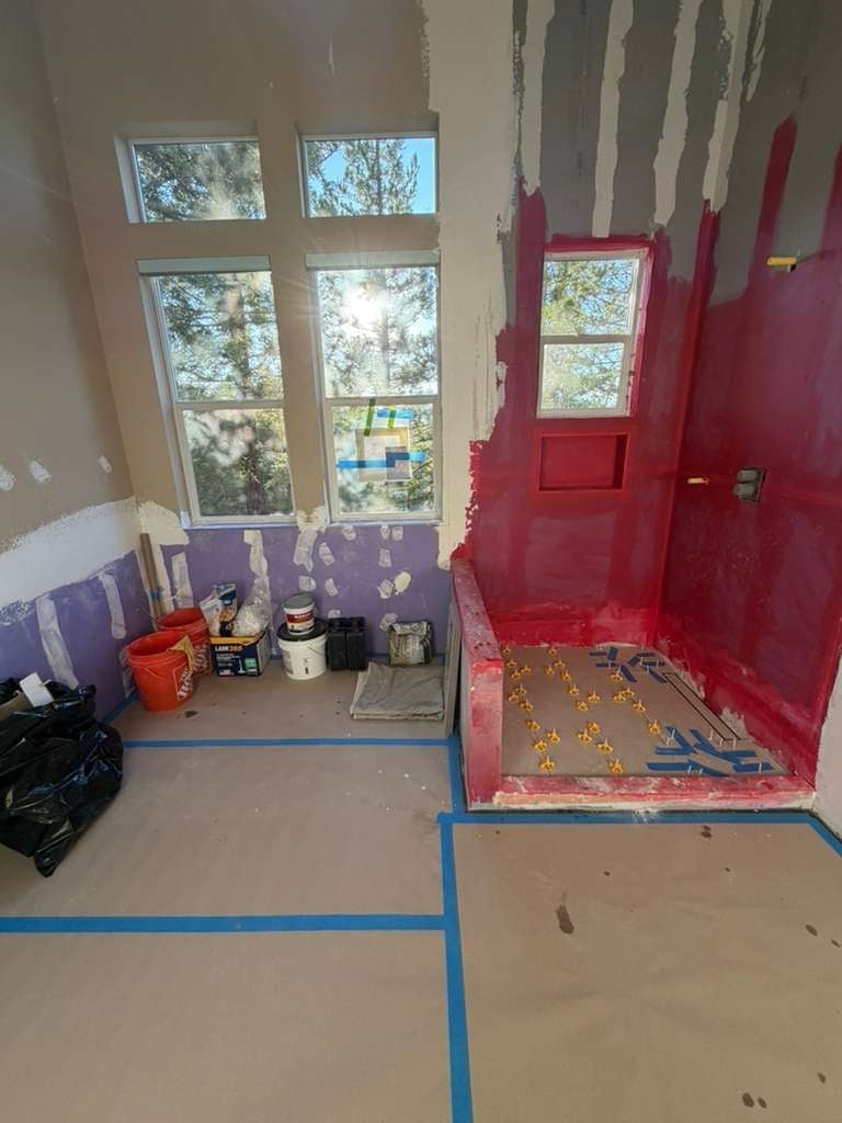 Interior room under renovation with red painted walls