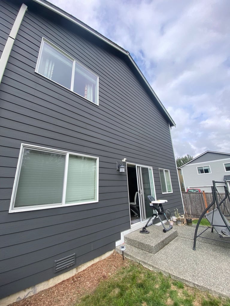 House exterior with outdoor furniture before deck construction