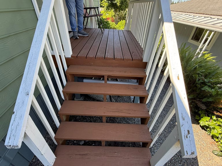 Weathered wooden deck stairs before renovation