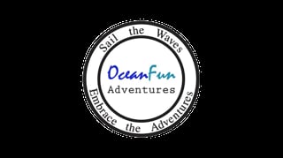 OceanFun Adventures circular logo with Sail the Waves and Embrace the Adventures text