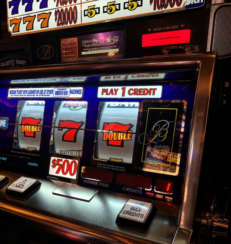 Slot machine displaying reels with 7s, Double symbol, and play controls with credit buttons