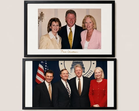 Two framed formal photographs showing groups of people at official events, displayed vertically against a light background.