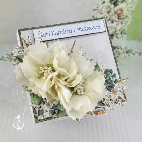 Elegant wedding invitation with white cream peony flower, greenery, lace, and label reading Slub Karoliny i Mateusza