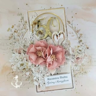 Elegant 60th anniversary card with gold numbers, pink flower, dried botanicals, heart decoration, and Polish text on cream background