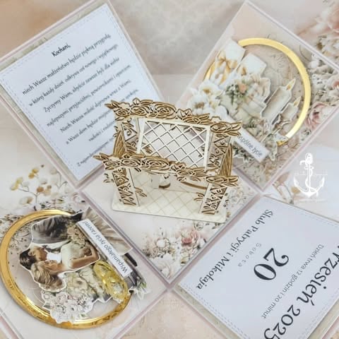 Elegant gift set with white porcelain jewelry holders, gold-tone decorative frame, dried flowers, instruction cards, and coordinating white circular dishes arranged on white surface