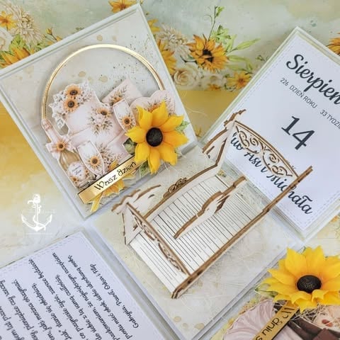 Sunflower-themed stationery collection with basket card, table number holder, and yellow flowers on cream background