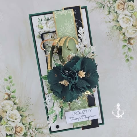 Handmade greeting card with dark green flowers, floral patterns, and decorative elements on white background
