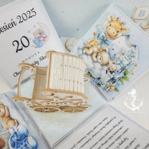 Baby shower invitation cards and decorations including teddy bears, crib illustration, and nautical anchor design