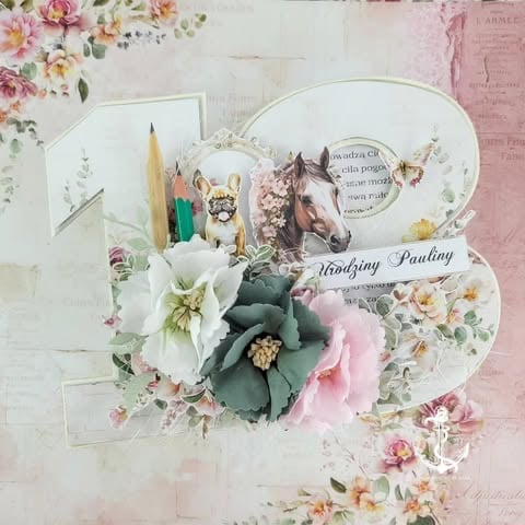 Scrapbook layout in butterfly shape with horse image, white 3D flowers, vintage papers, pencils, and floral embellishments in soft pink and cream tones